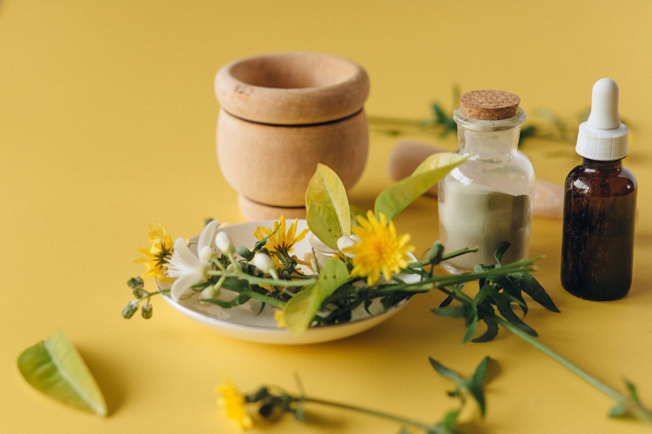 services-07 A collection of herbal remedies and natural ingredients on a yellow background, symbolizing holistic health.